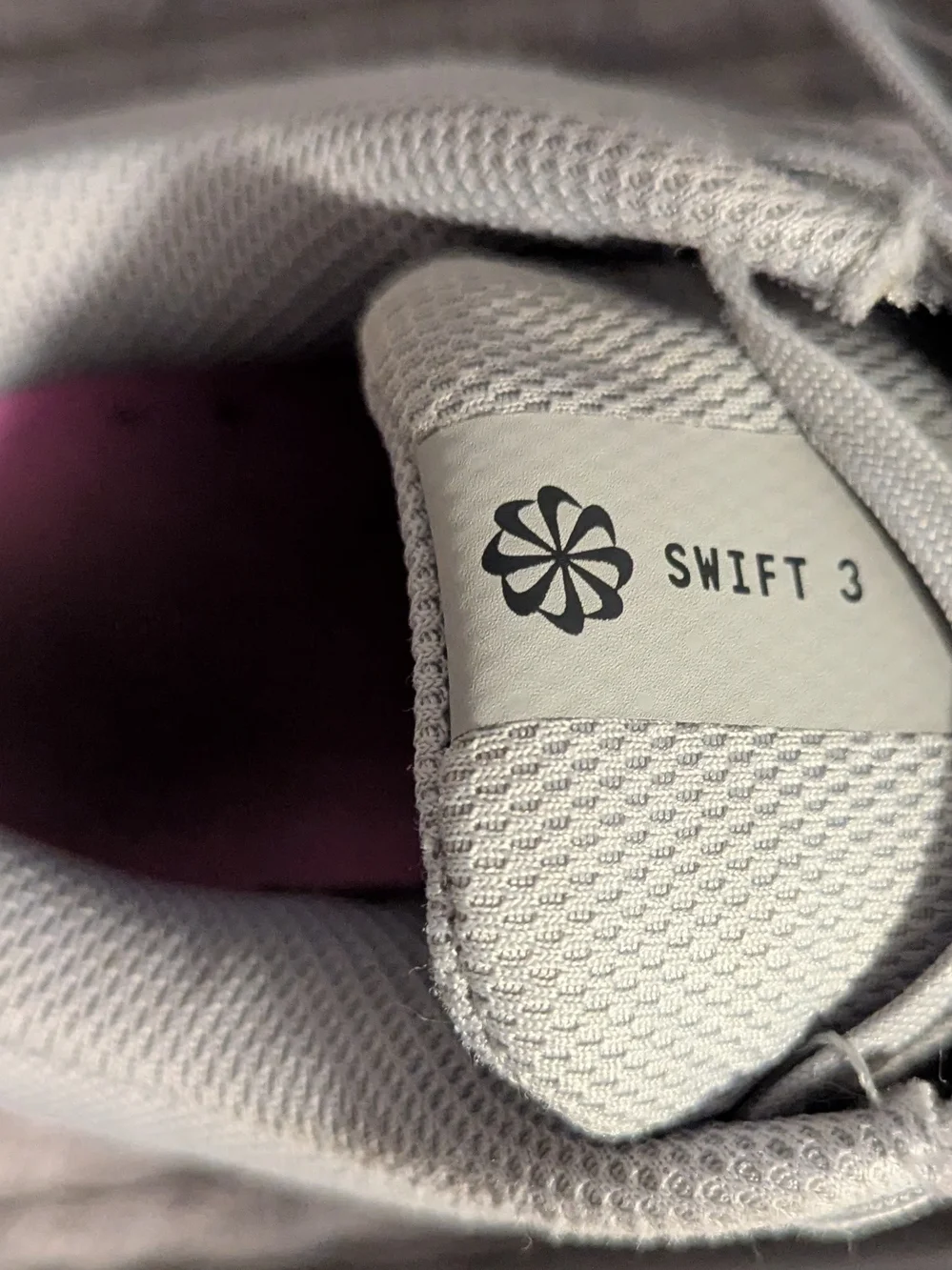 Nike Light Gray Athletic Sneakers with Pink Accents